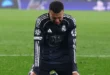 Kylian Mbappé con gestos de dolor durante un partido