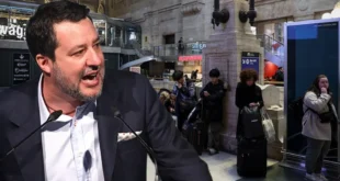 Ministro Matteo Salvini y gente espera en la estación de trenes de Milán