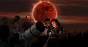 Luna llena teñida de color rojo intenso durante un eclipse lunar total