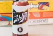 Lata clásica de cerveza Schlitz Premium con su logotipo rojo y dorado.