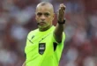 Árbitro Wilton Sampaio dirigiendo un partido de fútbol internacional