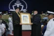 Ceremonia de investidura de la UMIP entregando el Doctorado Honoris Causa a Rodolfo Sabonge